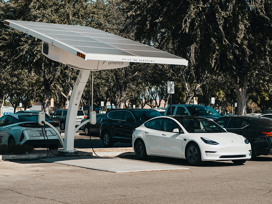 Solar powered electric vehicle points in carpark.