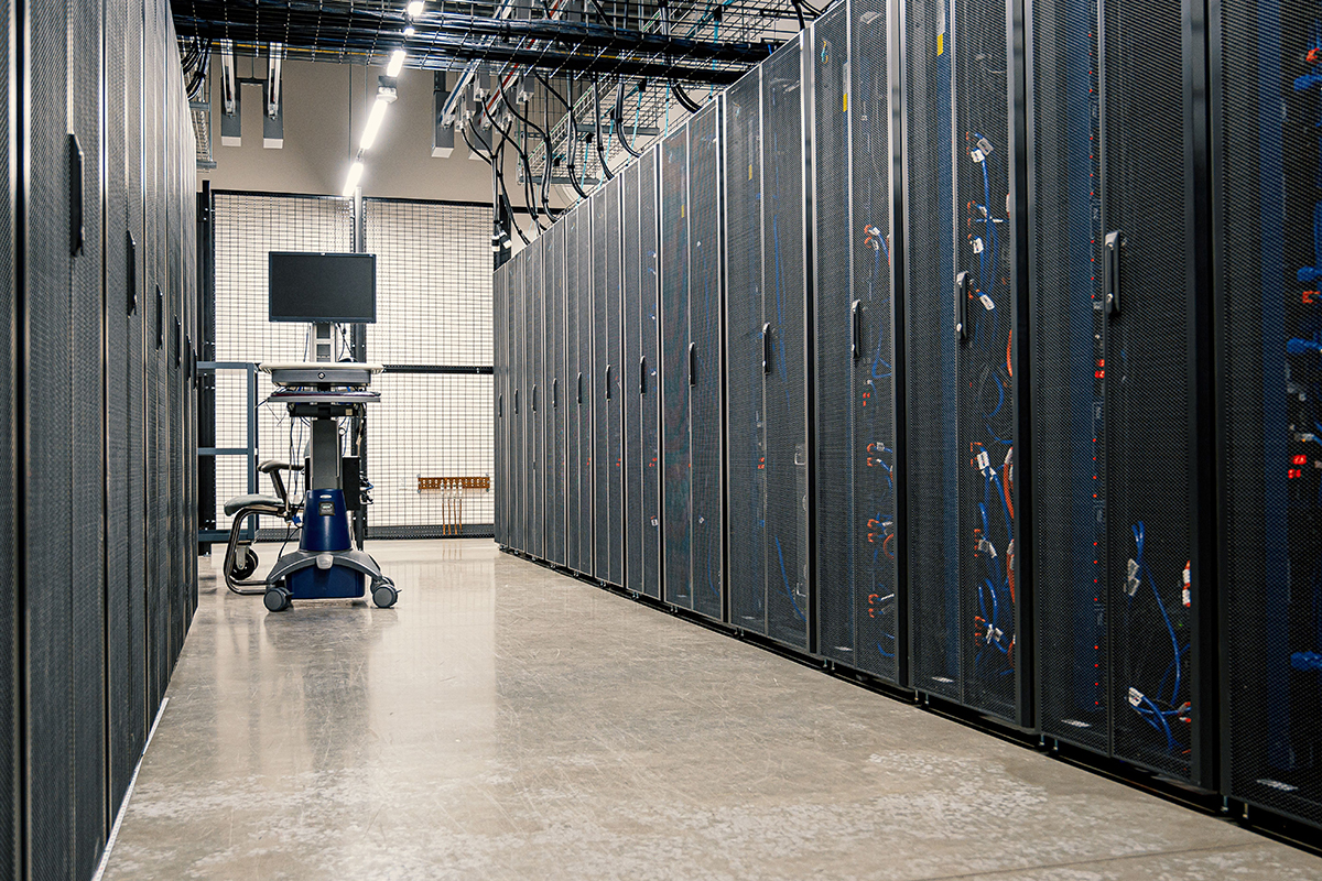 Racks of server cages in a modern data centre.